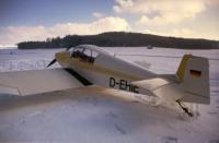 D-EHIE at EDPB, rear view, snow on the ground